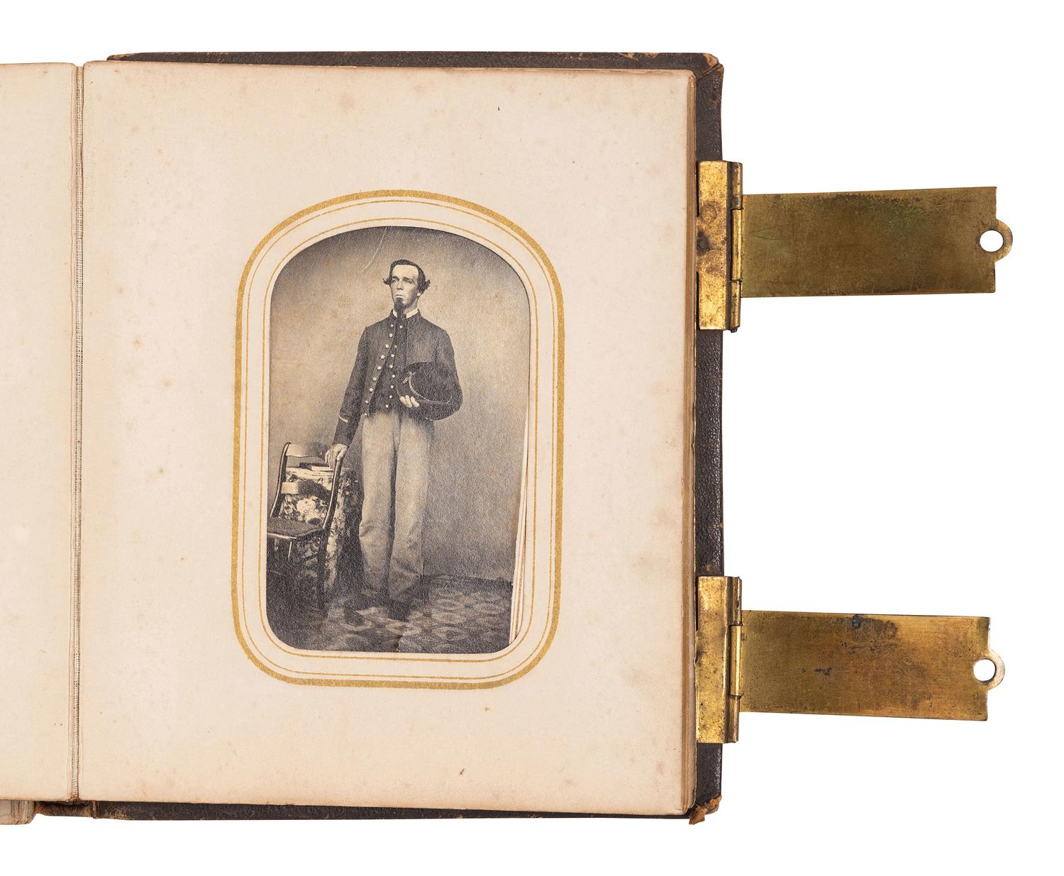 [CIVIL WAR]. CDV album containing images of 2 soldiers, incl. Corodon Mason, USCT, 32nd Infantry.