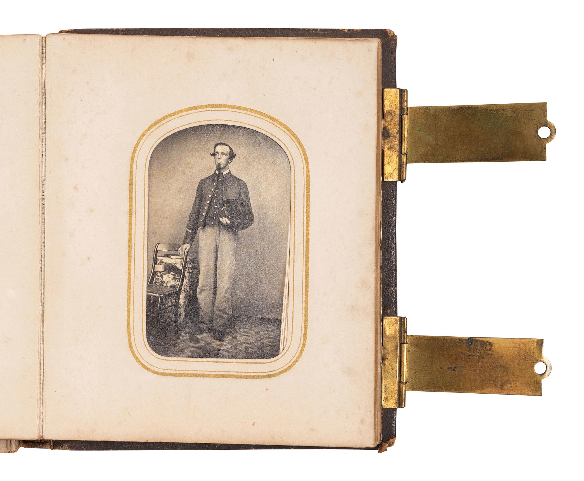 [CIVIL WAR]. CDV album containing images of 2 soldiers, incl. Corodon Mason, USCT, 32nd Infantry.
