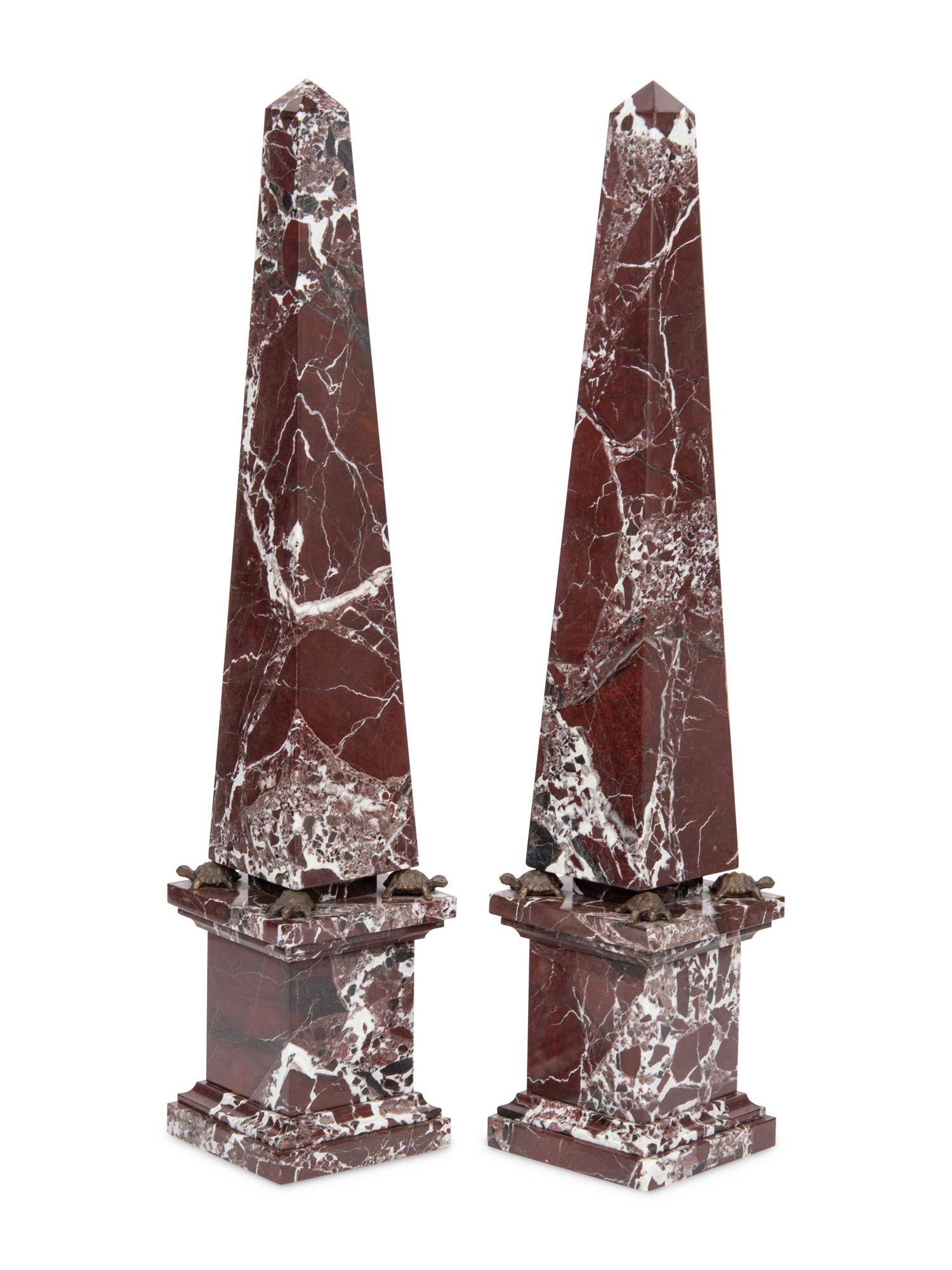 A Pair of Red Marble Obelisks
