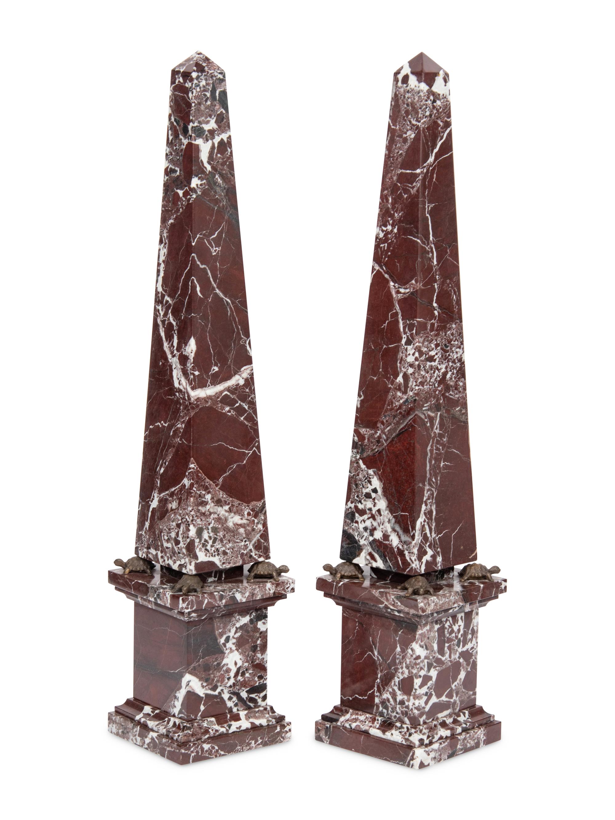 A Pair of Red Marble Obelisks