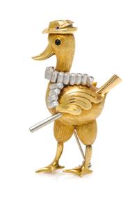 An 18 Karat Two Tone Gold, Diamond, Onyx and Ruby, Articulated Duck Hunting Motif Brooch, Cartier, Italy, 13.60 dwts.
