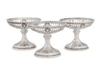 A Group of American Silver Cups and Saucers