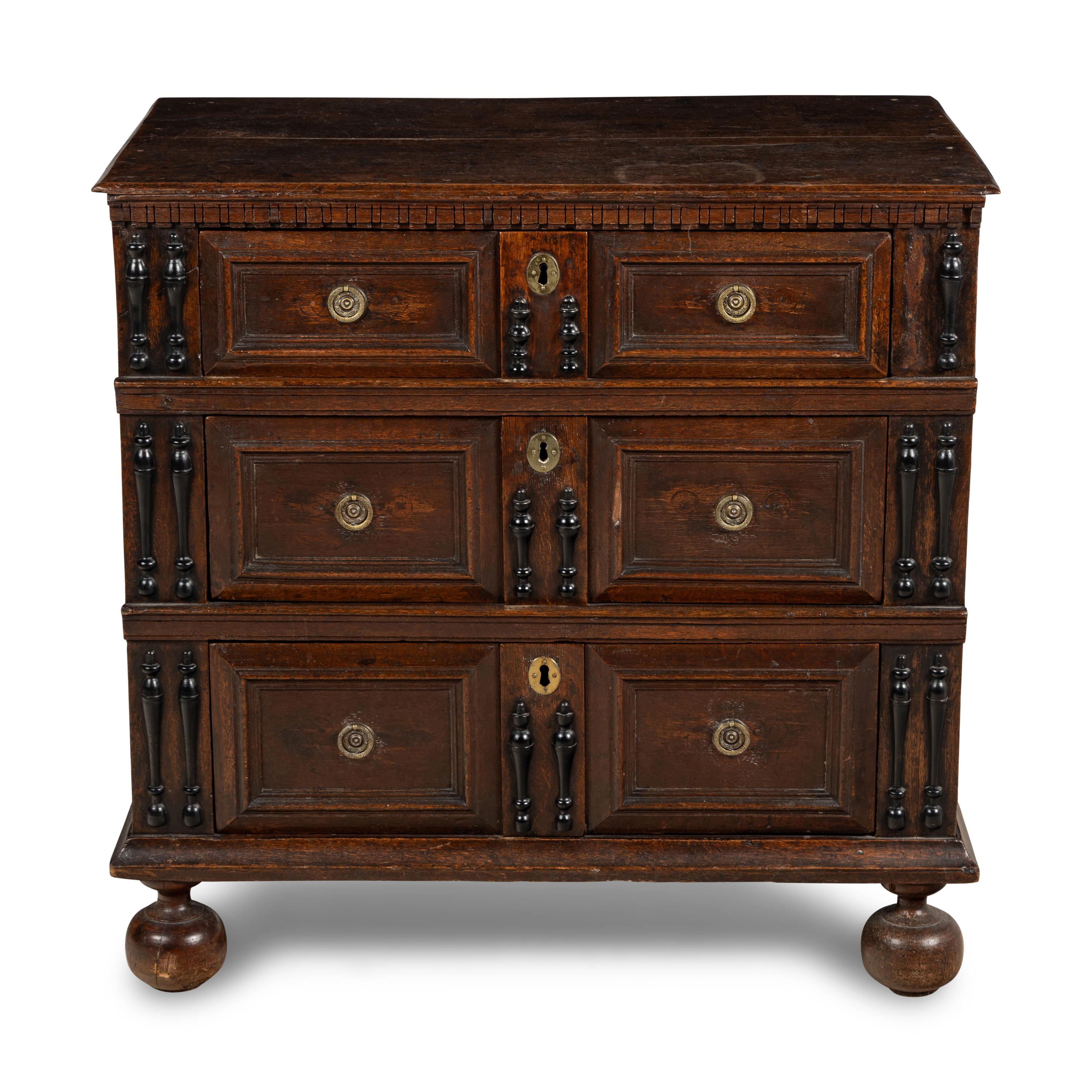 A Charles II Oak Chest of Drawers