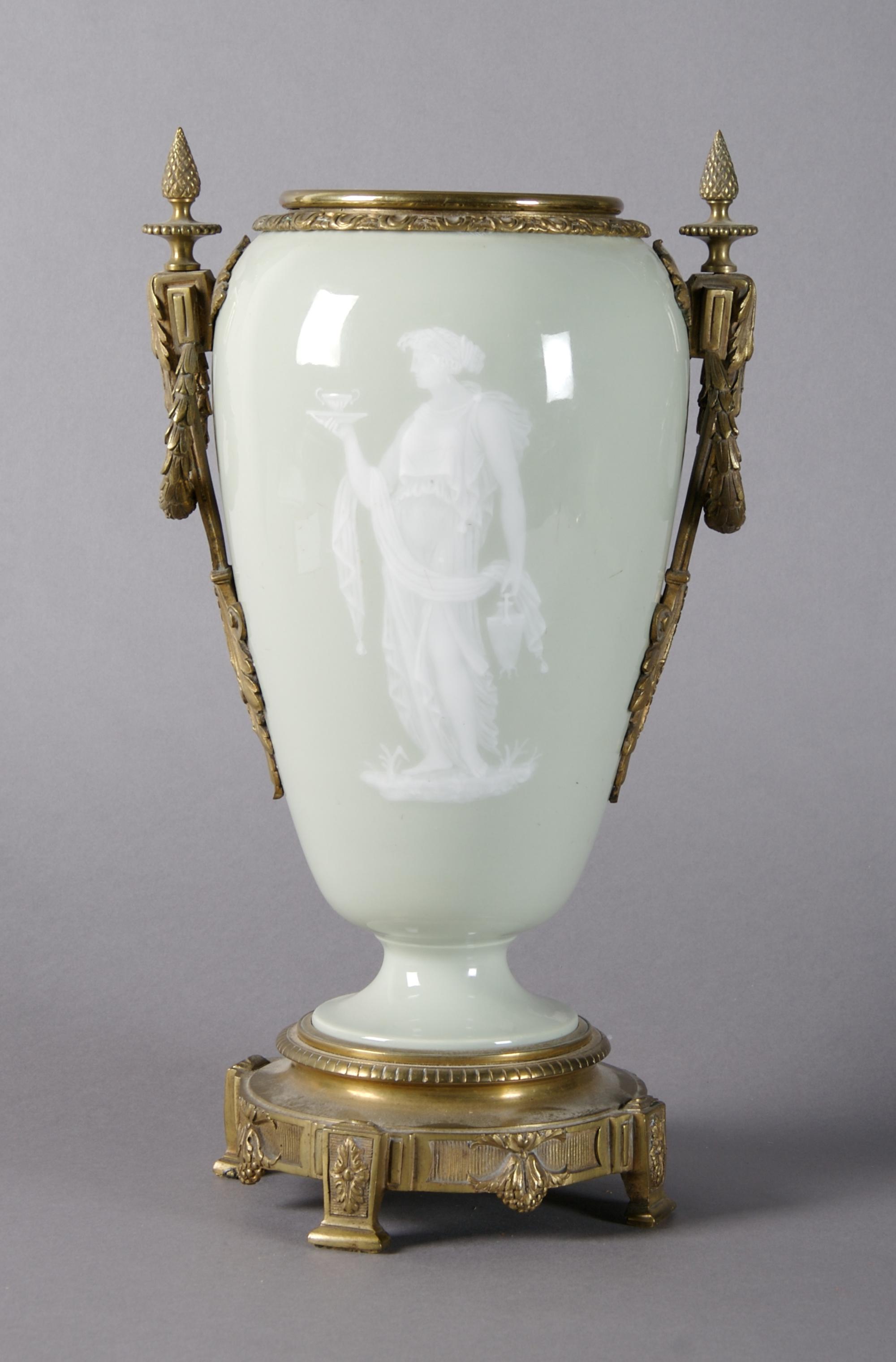 A Continental Gilt Bronze Mounted Pate-sur-Pate Urn, Height 14 1/2 inches.