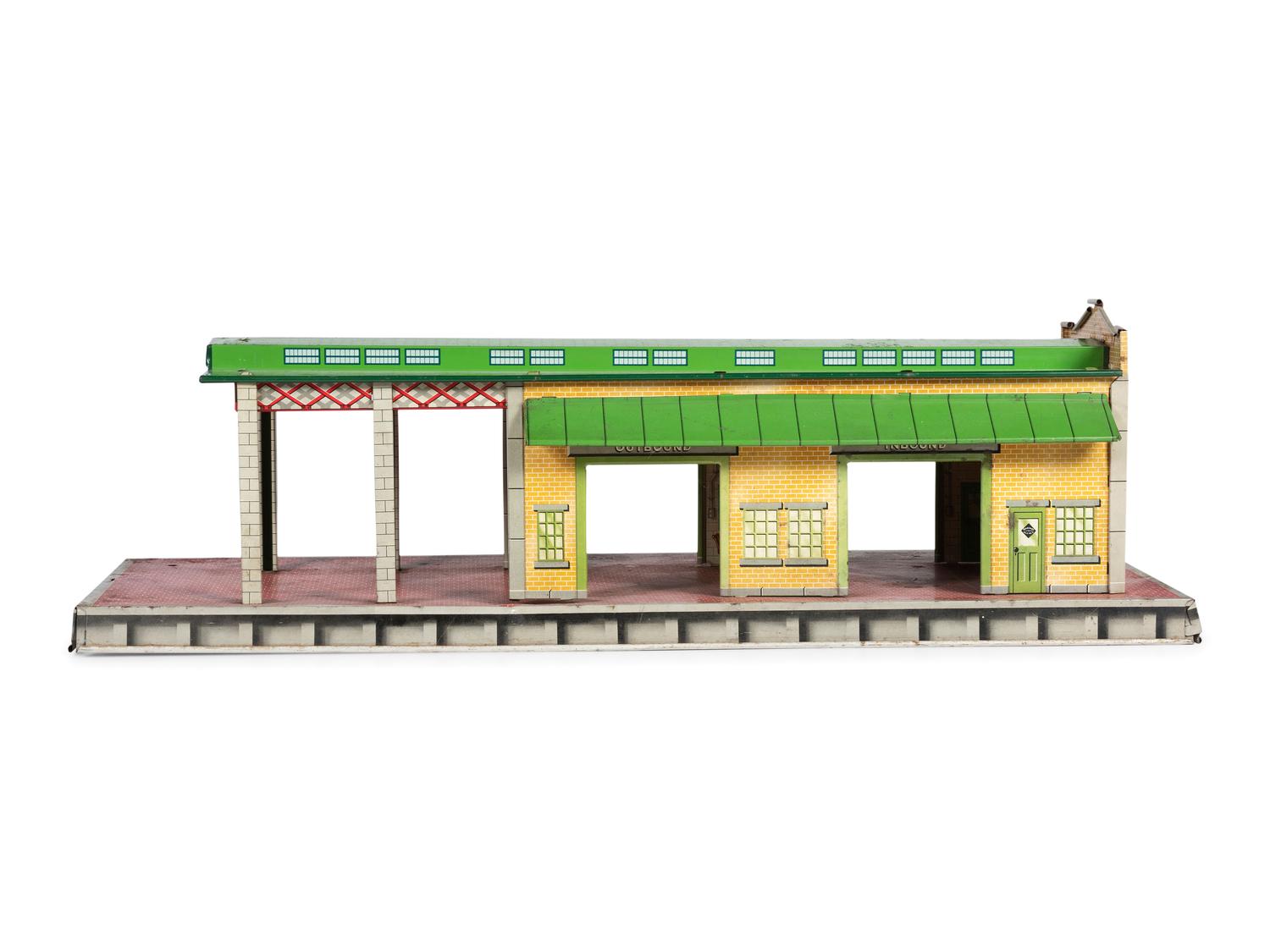 A Group of Toy Service Stations and Cars