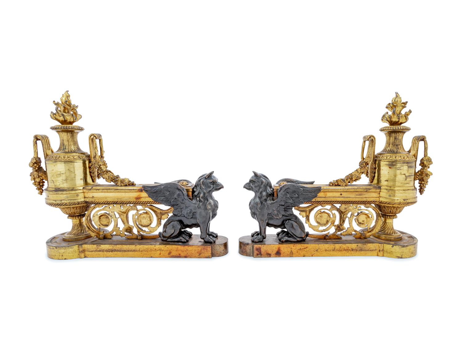 A Pair of Empire Style Gilt and Patinated Bronze Chenets