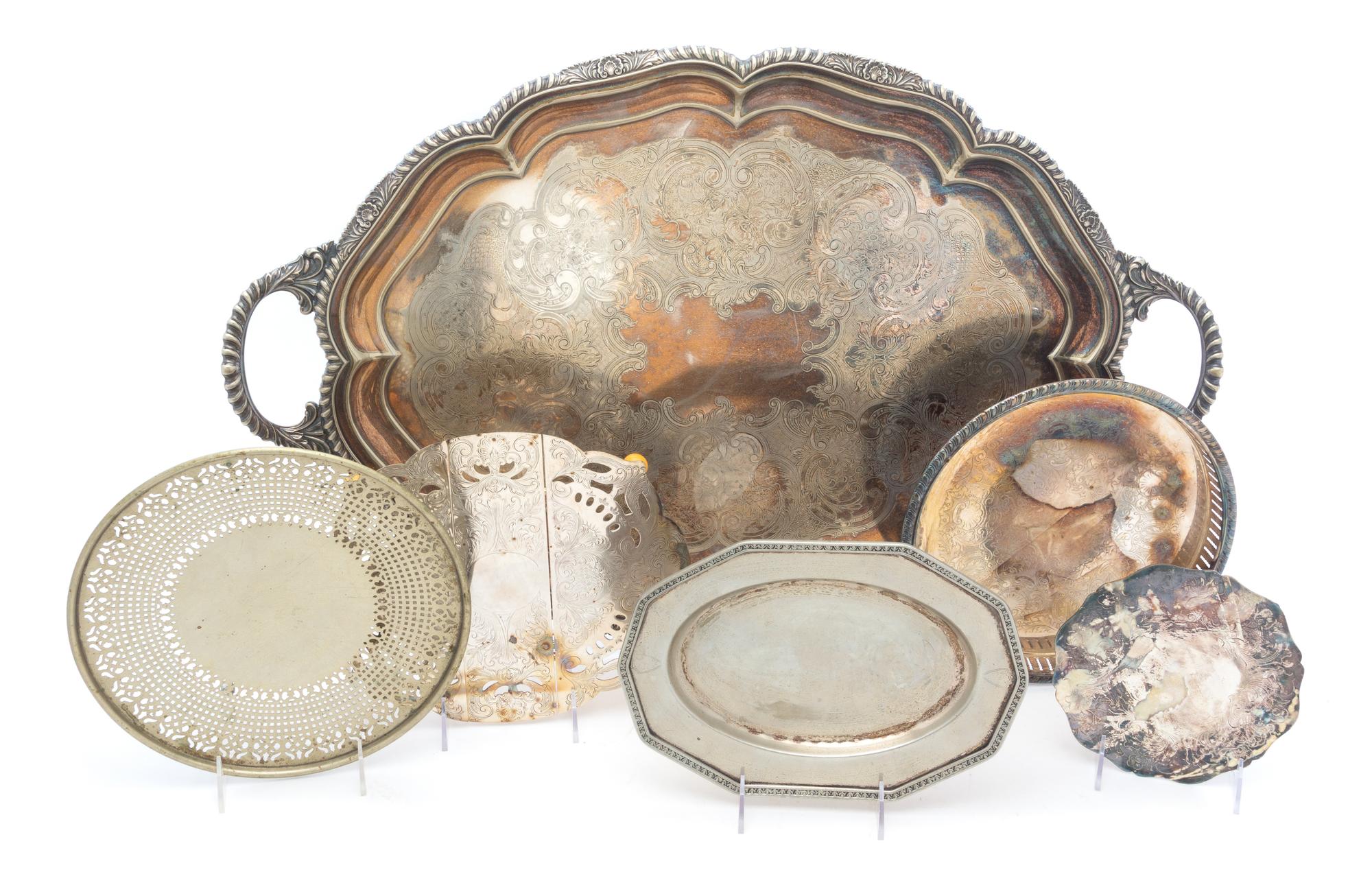 A Collection of Silver-plate and Pewter Trays Width of widest over handles 29 inches. — 20TH CENTURY
