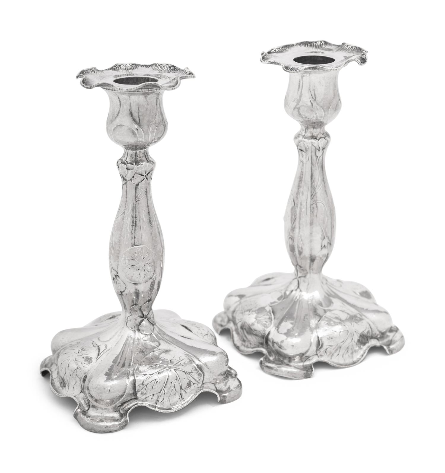 A Pair of Gorham Martelé Silver Candlesticks