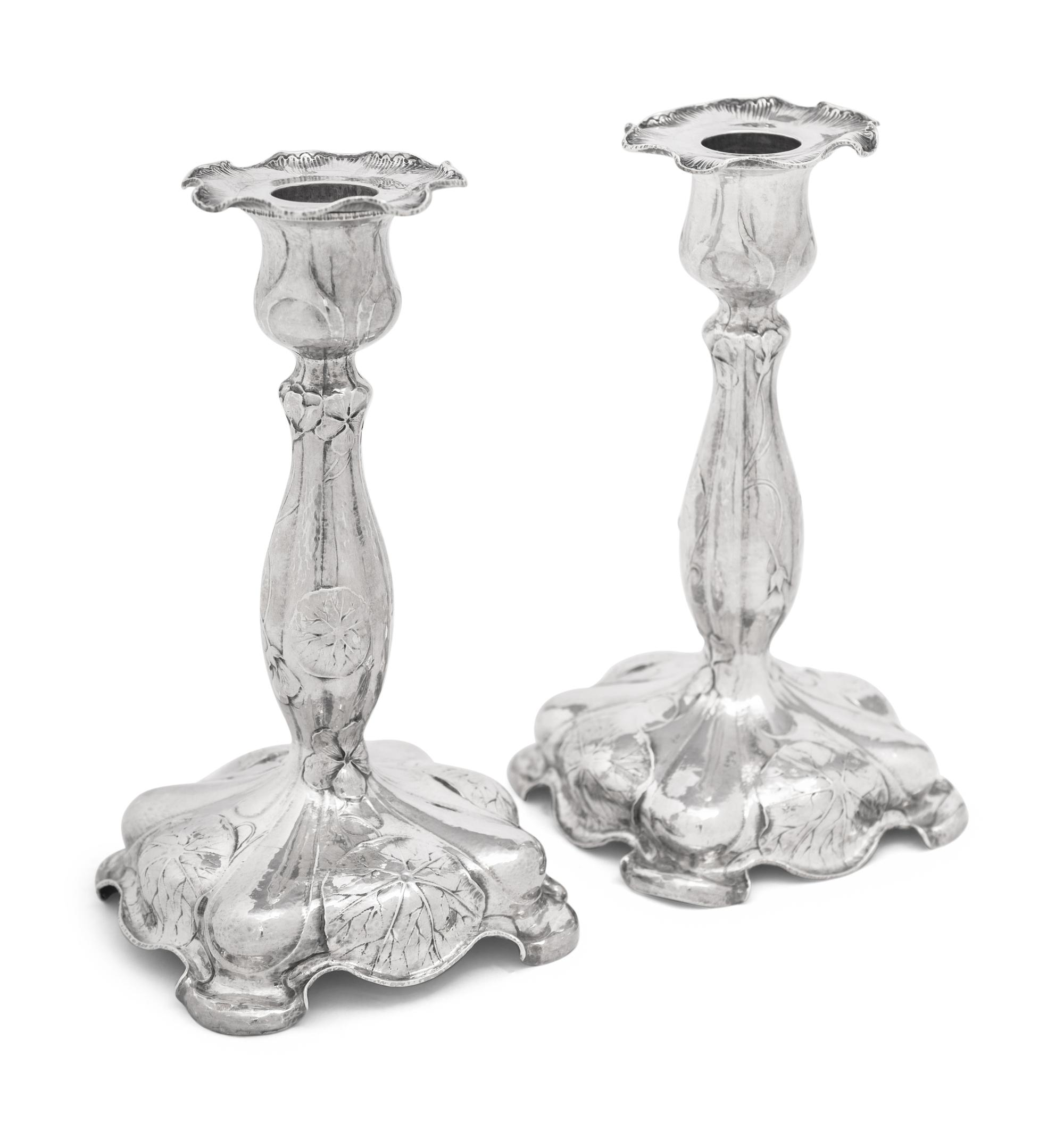 A Pair of Gorham Martelé Silver Candlesticks
