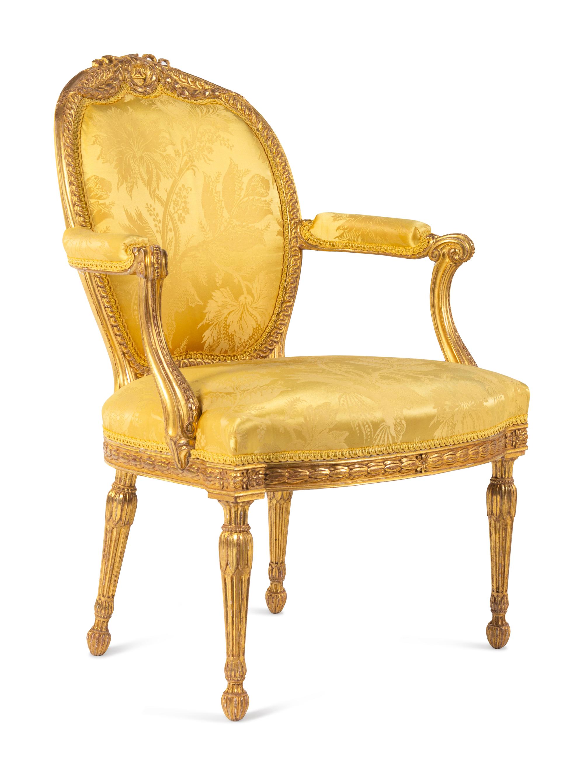 A Pair of George III Carved Giltwood Armchairs