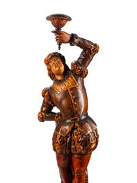 An Austrian Carved and Stained Wood Figural Torchère — LATE 19TH CENTURY