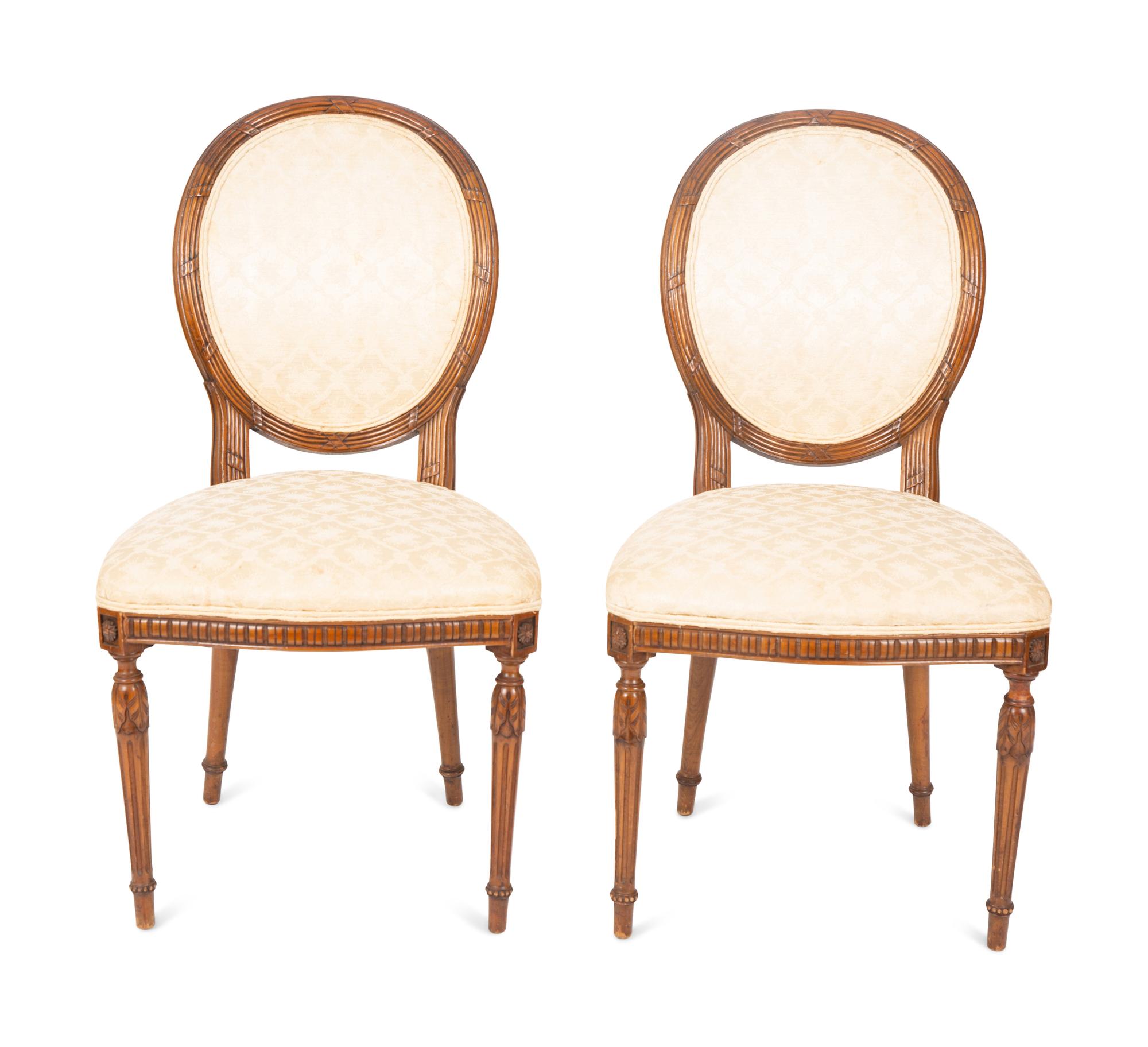A Set of Four Louis XVI Style Side Chairs