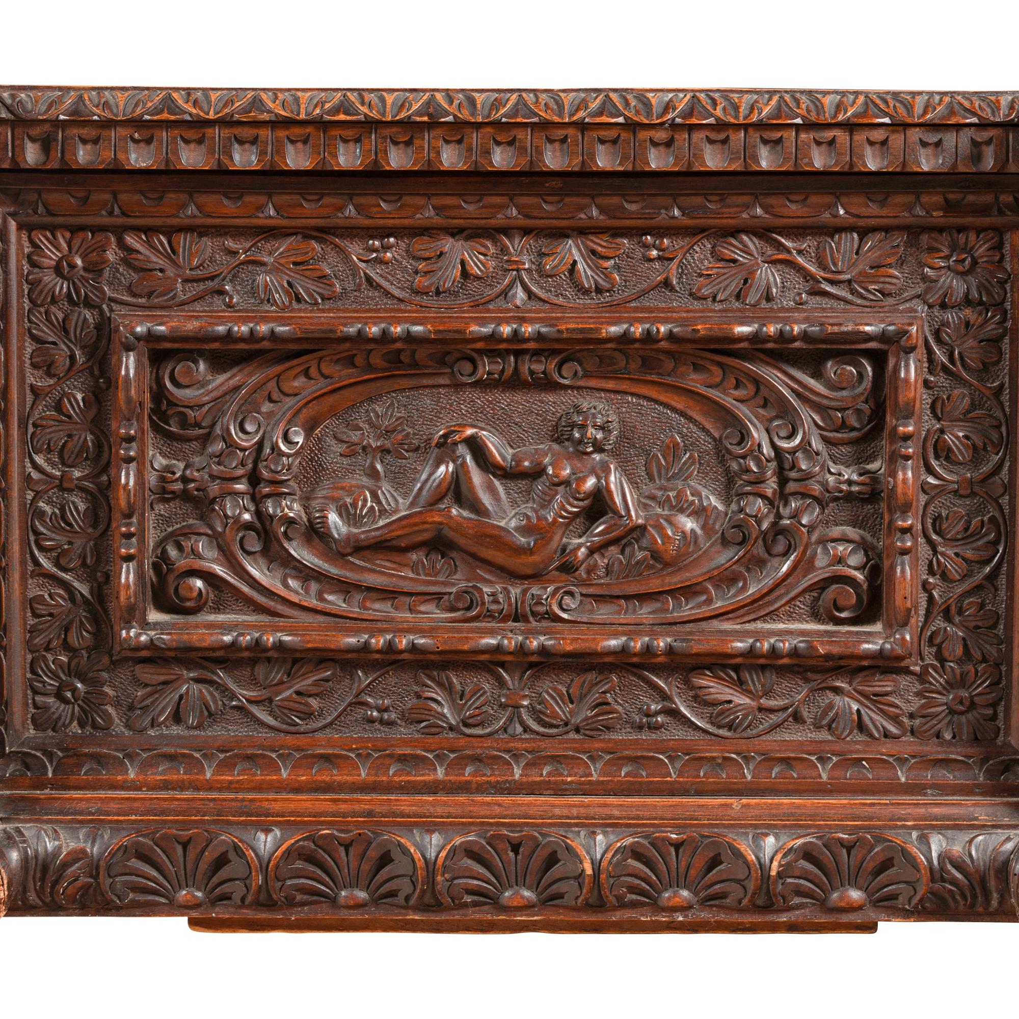 An Italian Carved Walnut Coffer
