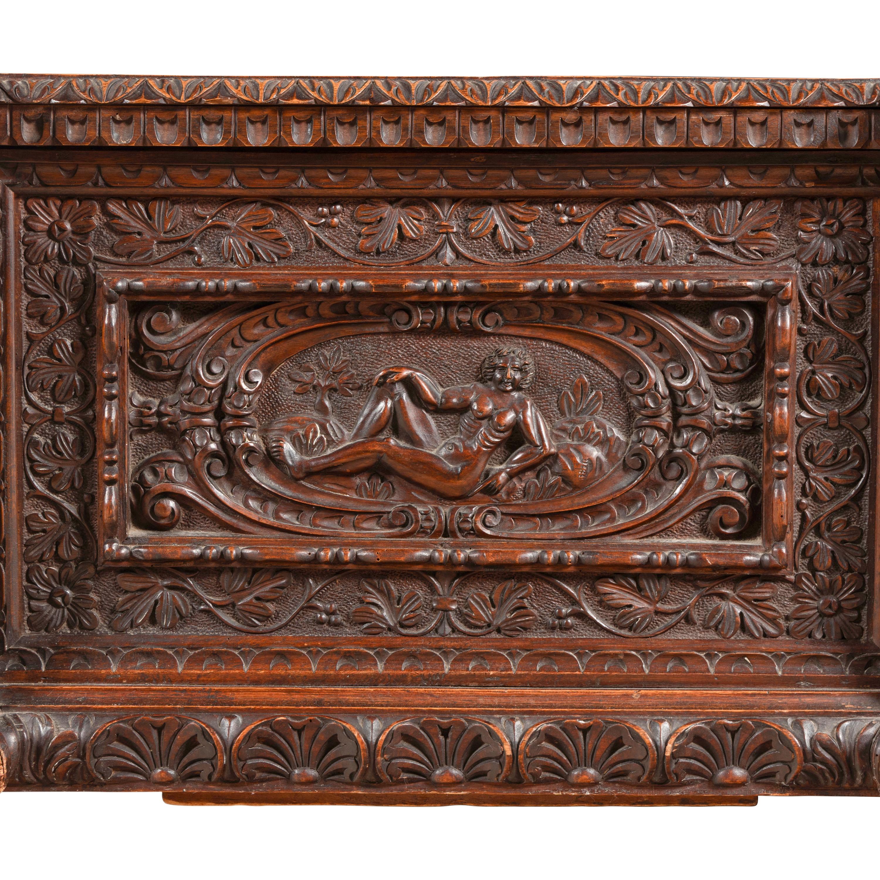 An Italian Carved Walnut Coffer