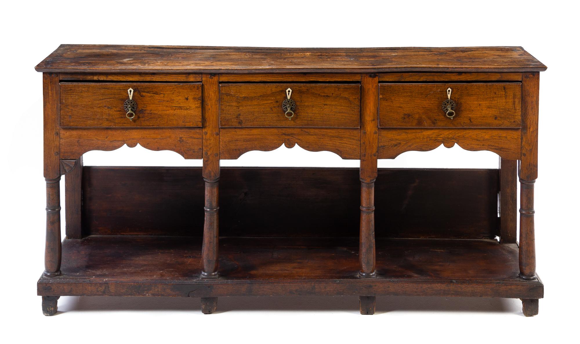 A Welsh Oak Sideboard Height 30 1/2 x width 60 1/2 x depth 16 3/4 inches. — CIRCA 1800