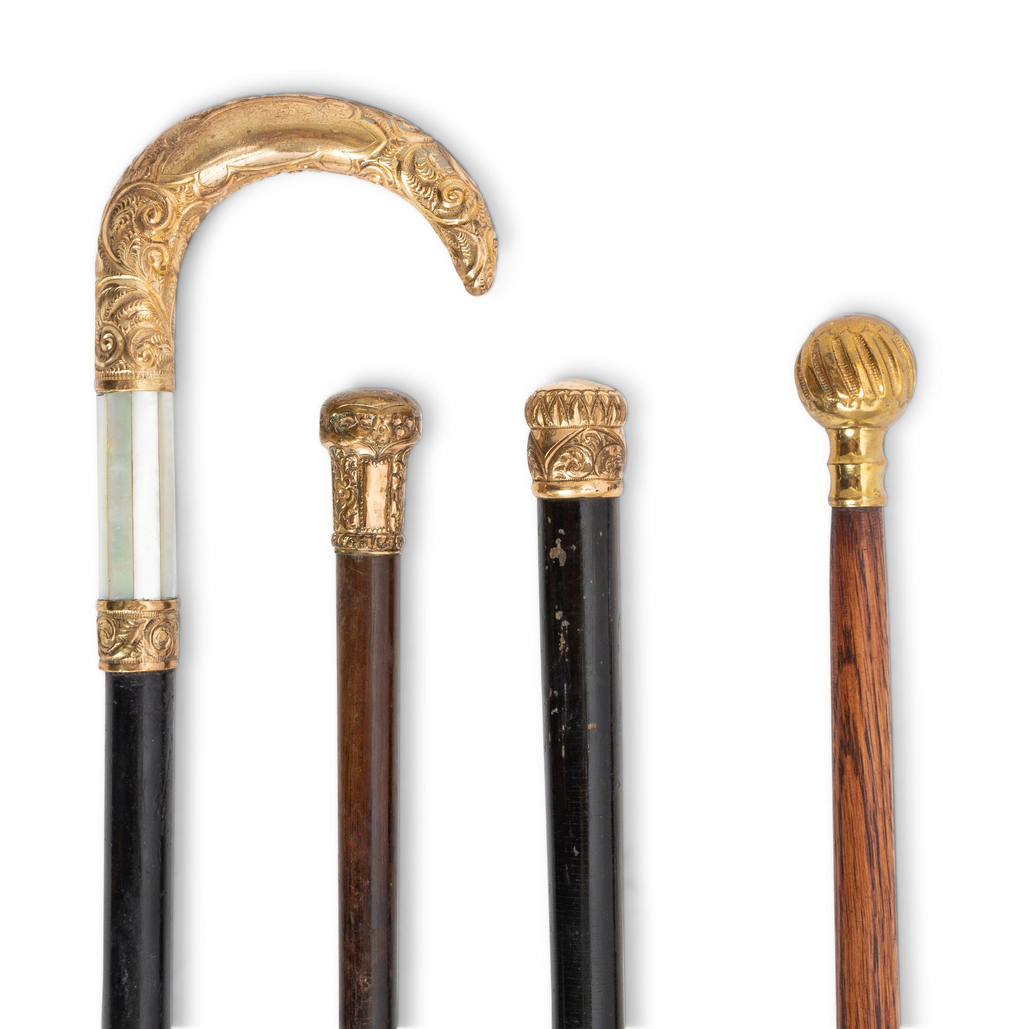 A Collection of Gold Mounted Canes