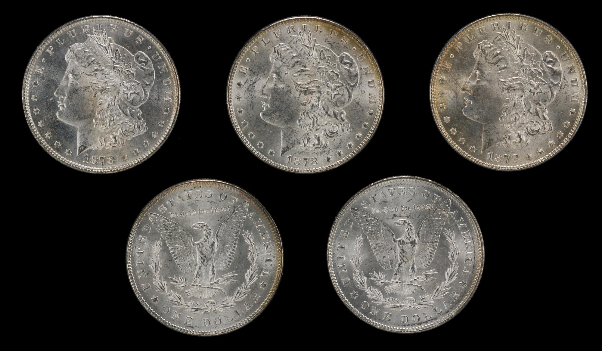 A Group of Five United States 1878 Morgan Silver Dollar Coins