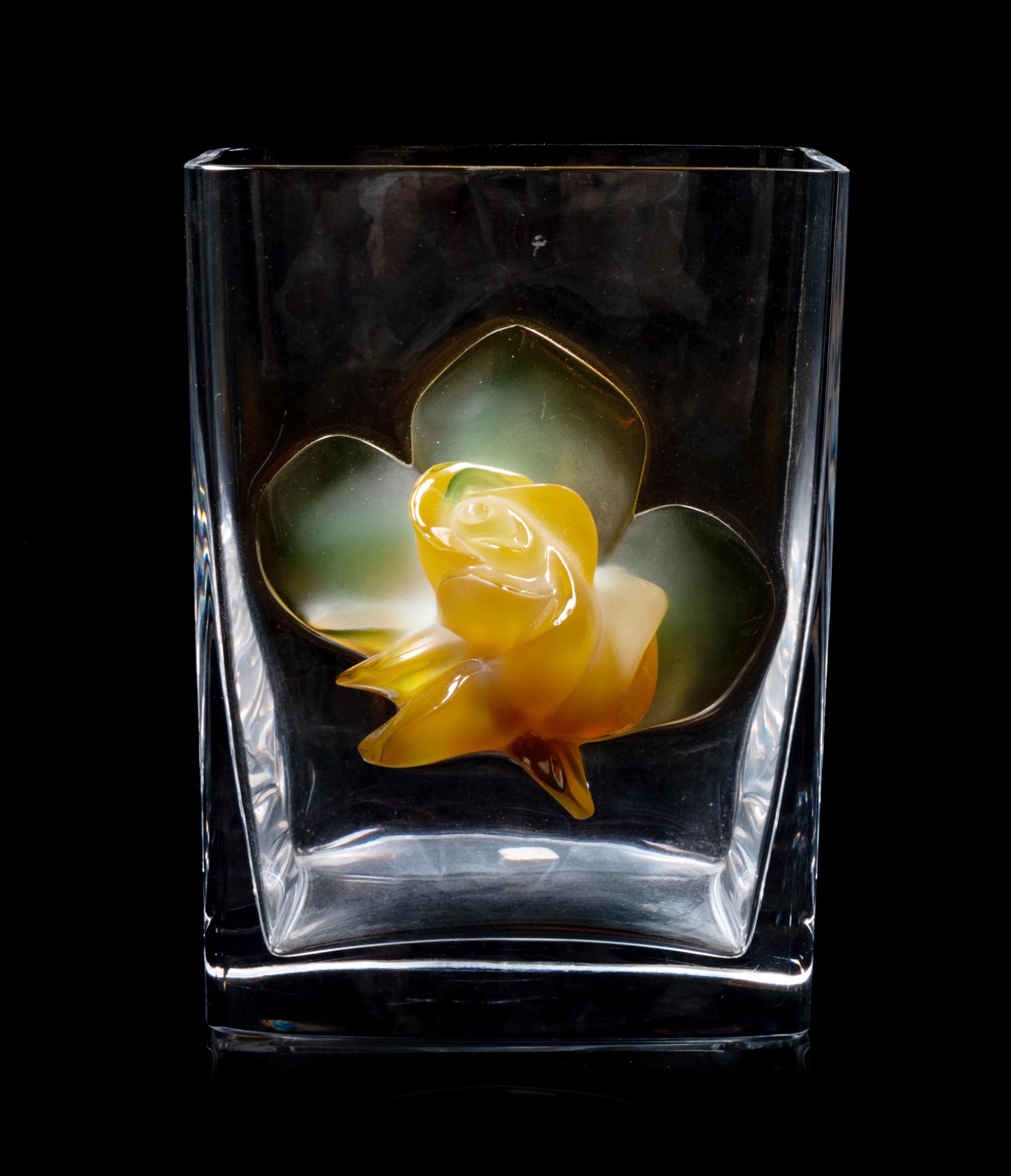 A Lalique Colored Glass Vase Height 8 1/2 x width 6 1/4 inches.