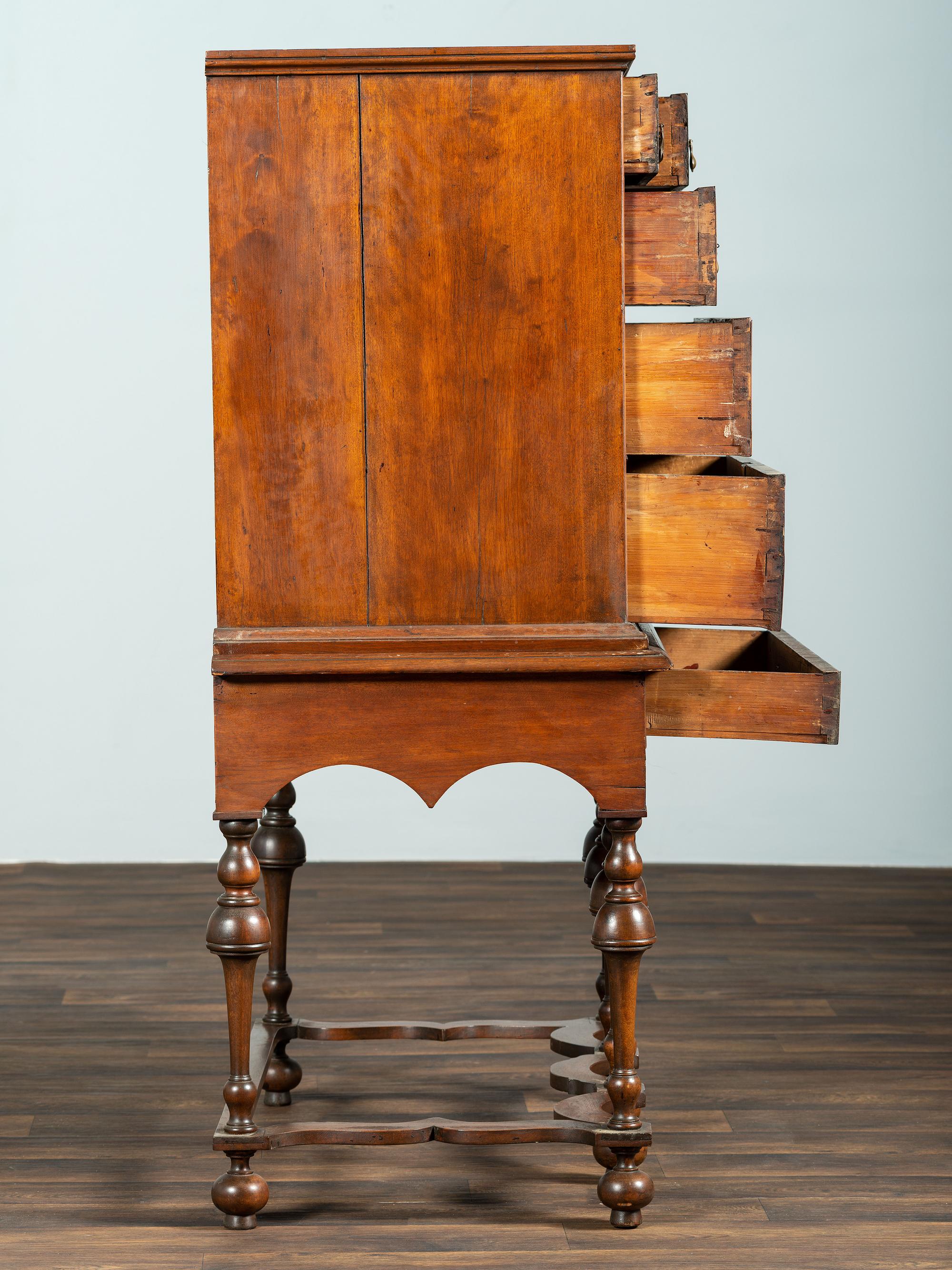 A William and Mary Maple and Feather-Banded Walnut Veneered Flat-Top High Chest