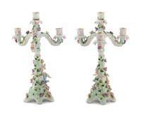 A Pair of Continental Porcelain Figural Candelabra