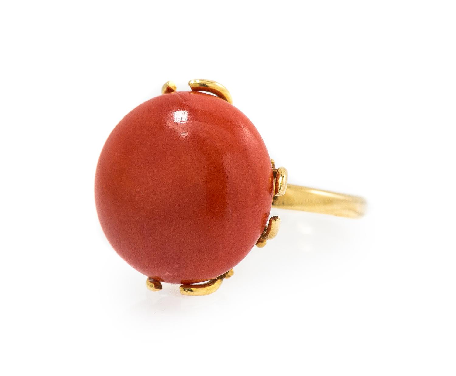 An 18 Karat Yellow Gold and Coral Ring, 15.80 dwts.