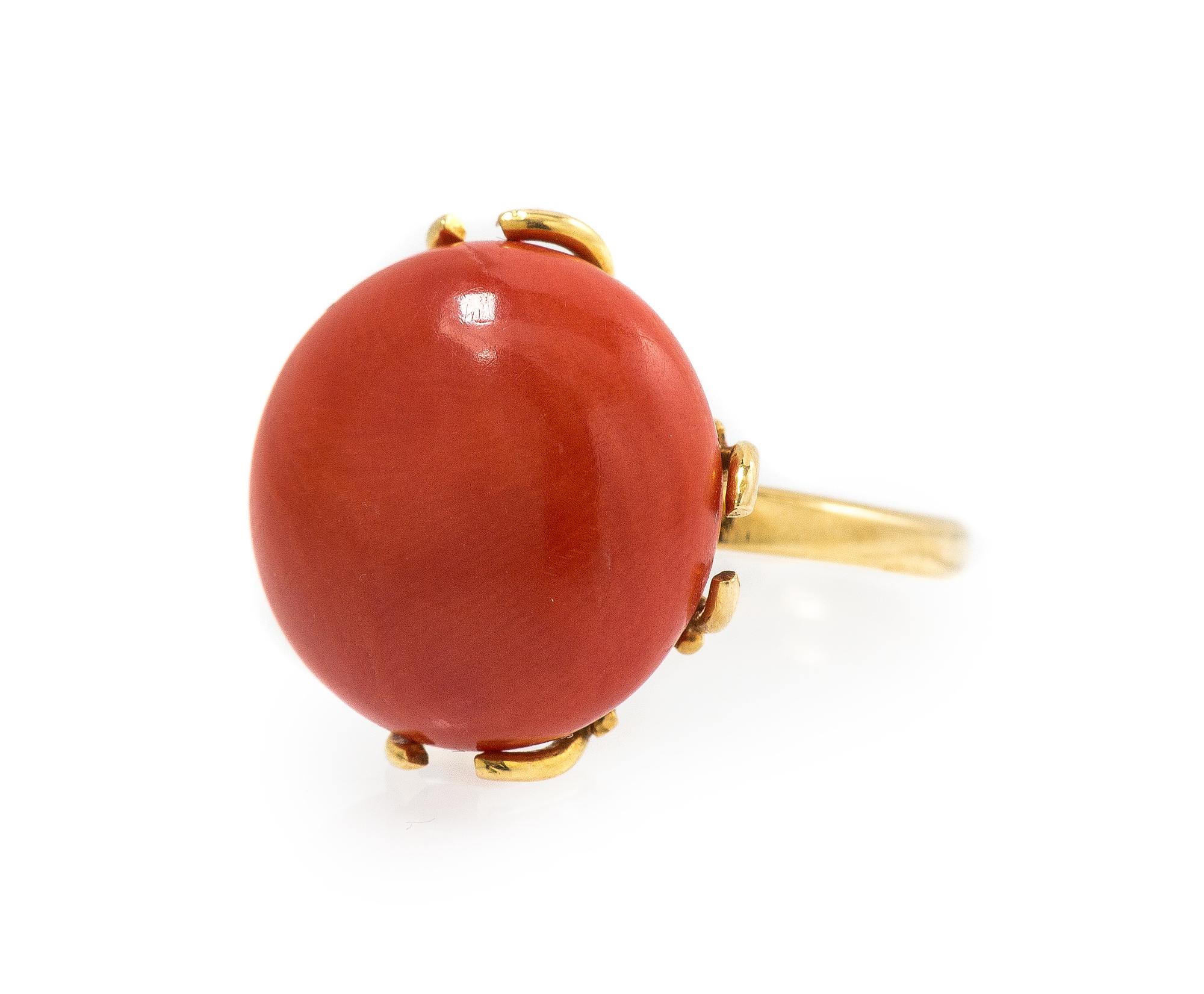 An 18 Karat Yellow Gold and Coral Ring, 15.80 dwts.