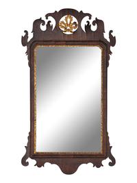 A Chippendale Carved and Parcel-Gilt Figured Mahogany Looking Glass