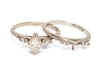 A 14 Karat White Gold and Diamond Ring Set,