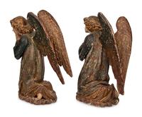 A Pair of Carved and Polychrome Decorated Figures of Kneeling Angels