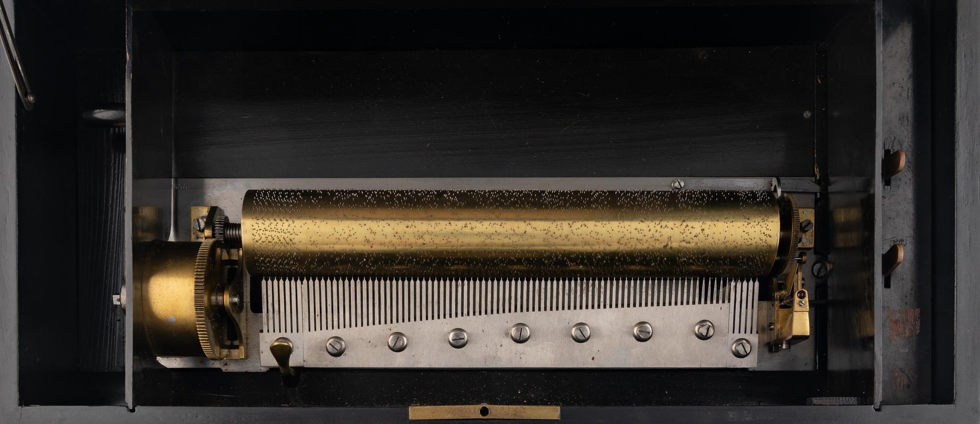 A Hidden Drum and Bell Music Box by J.H. Heller