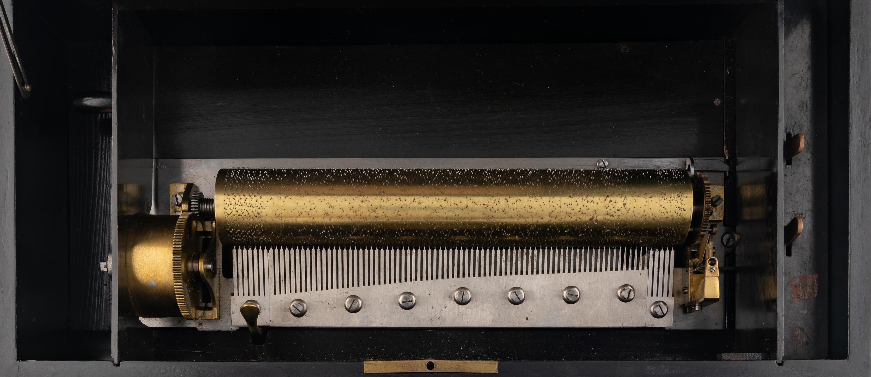 A Hidden Drum and Bell Music Box by J.H. Heller
