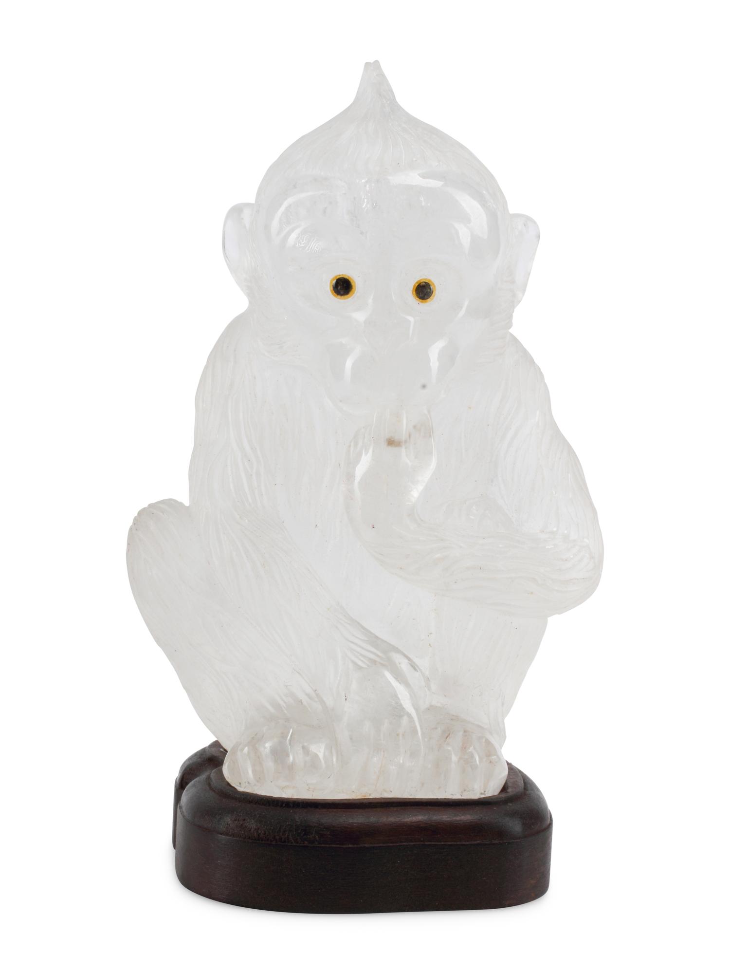 A Carved Rock Crystal Model of a Seated Monkey