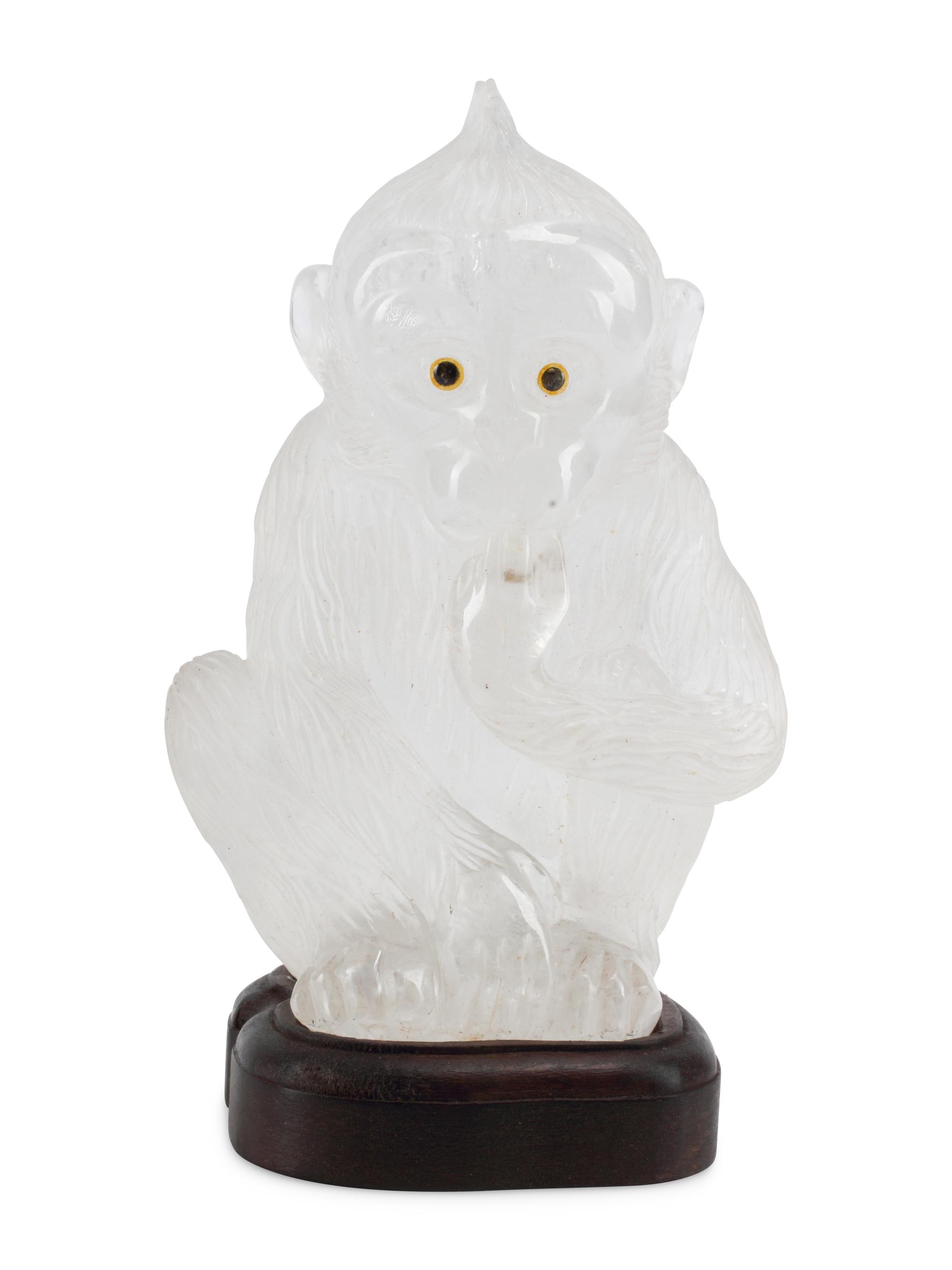 A Carved Rock Crystal Model of a Seated Monkey
