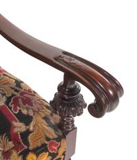 A William and Mary Style Carved Mahogany Armchair