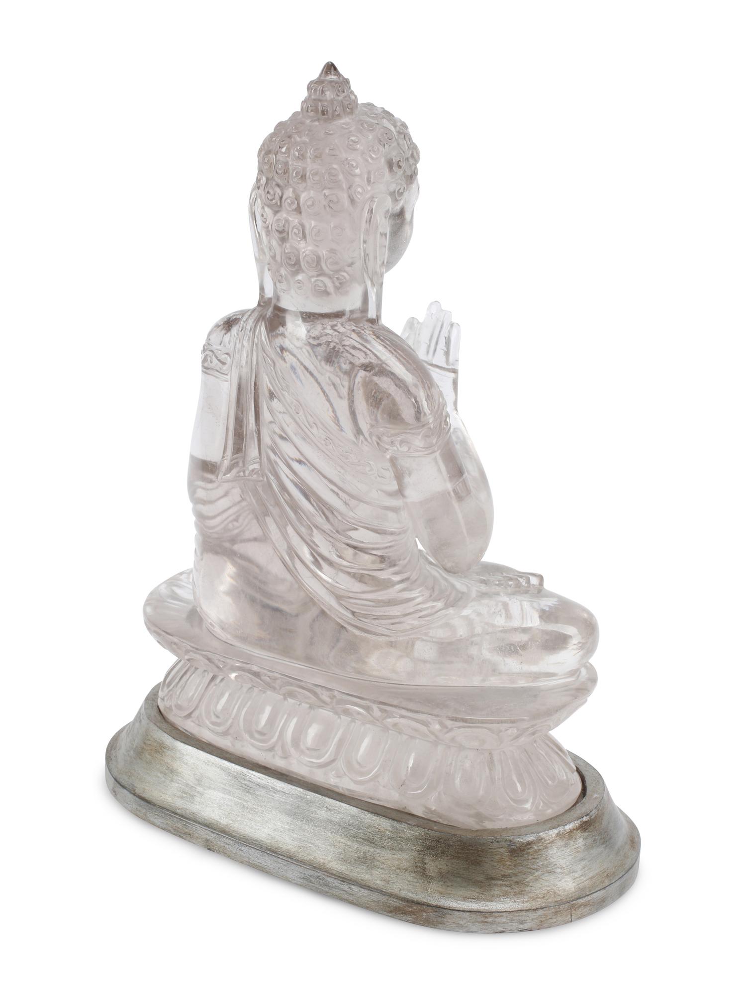 A Large Rock Crystal Seated Figure of Buddha
