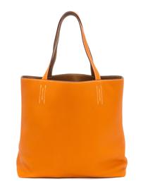 An Hermes Orange/Gold 45cm Taurillon Clemence Double Sens Tote, 17.5" x 15.5" x 5".