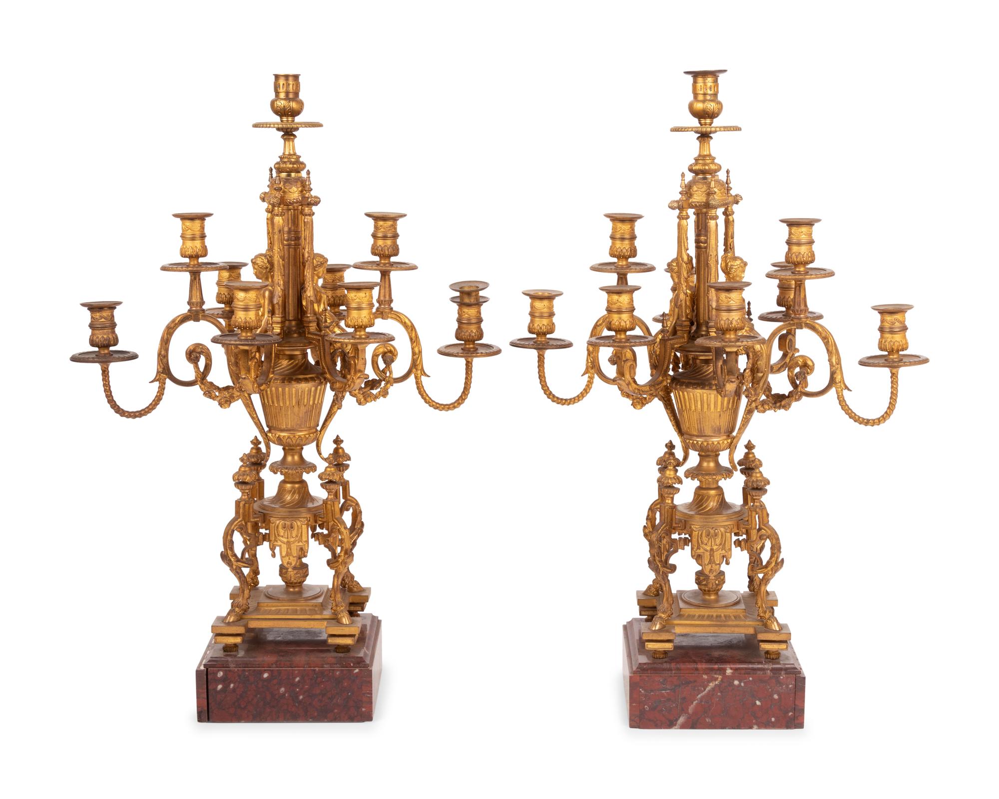 A Pair of Napoleon III Gilt Bronze and Rouge Marble Nine-Light Candelabra
