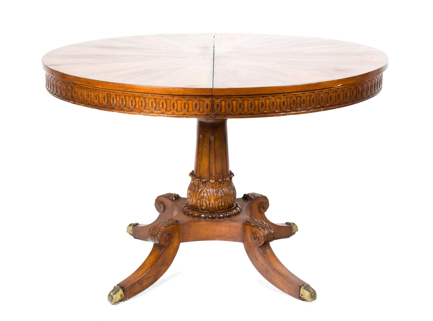 A Continental Inlaid Walnut Table Diameter 44 inches (closed); width of each leaf 23 7/8 inches. — 20TH CENTURY