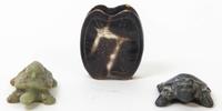 A Group of Three Carved Hardstone Toggles Length of longest 2 3/8 inches.