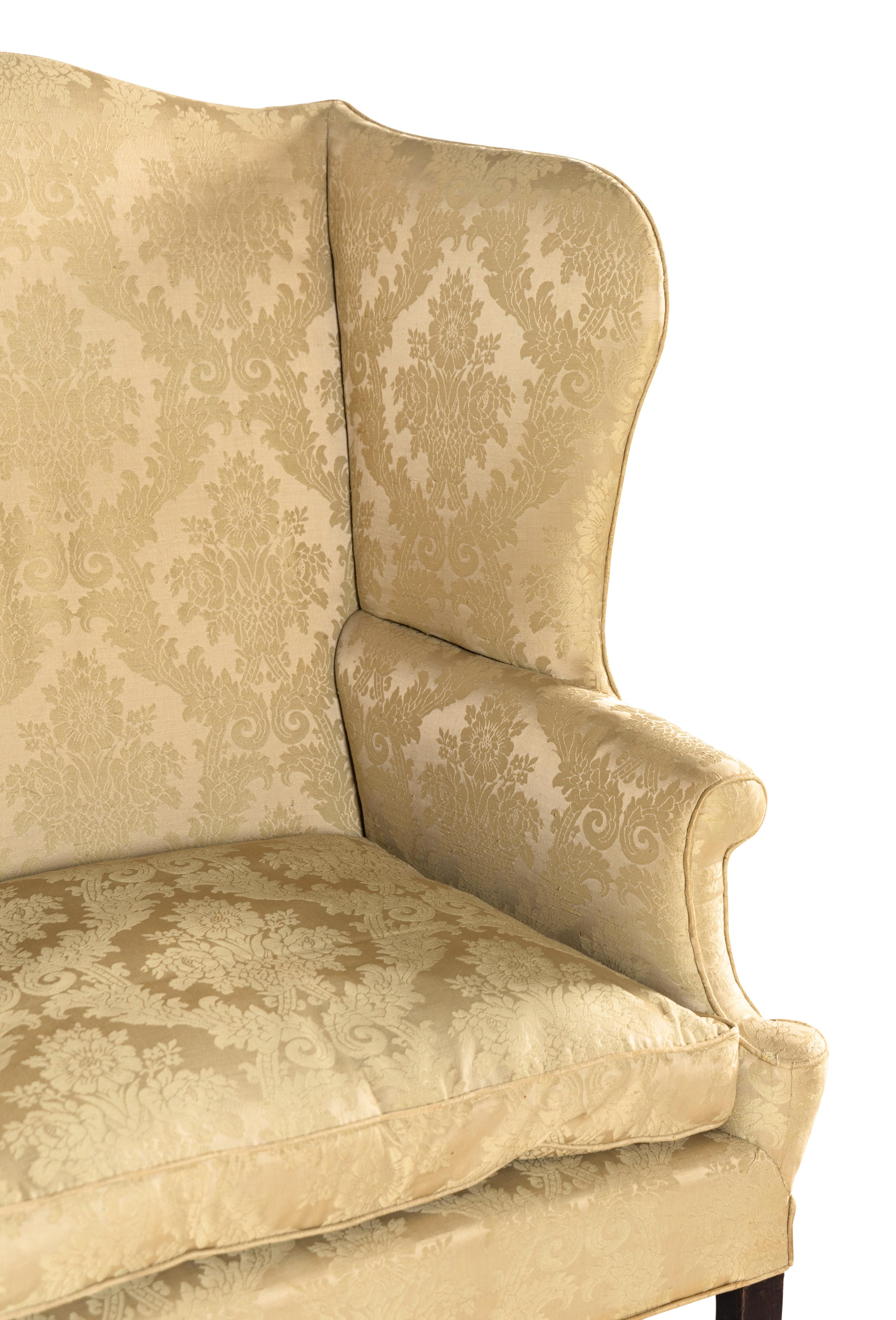 A George III Mahogany Wingback Chair