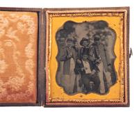 [EARLY PHOTOGRAPHY]. A trio of tintypes featuring pairs or groups of men, some military.