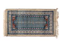 A Turkish or Afghan Wool Rug
