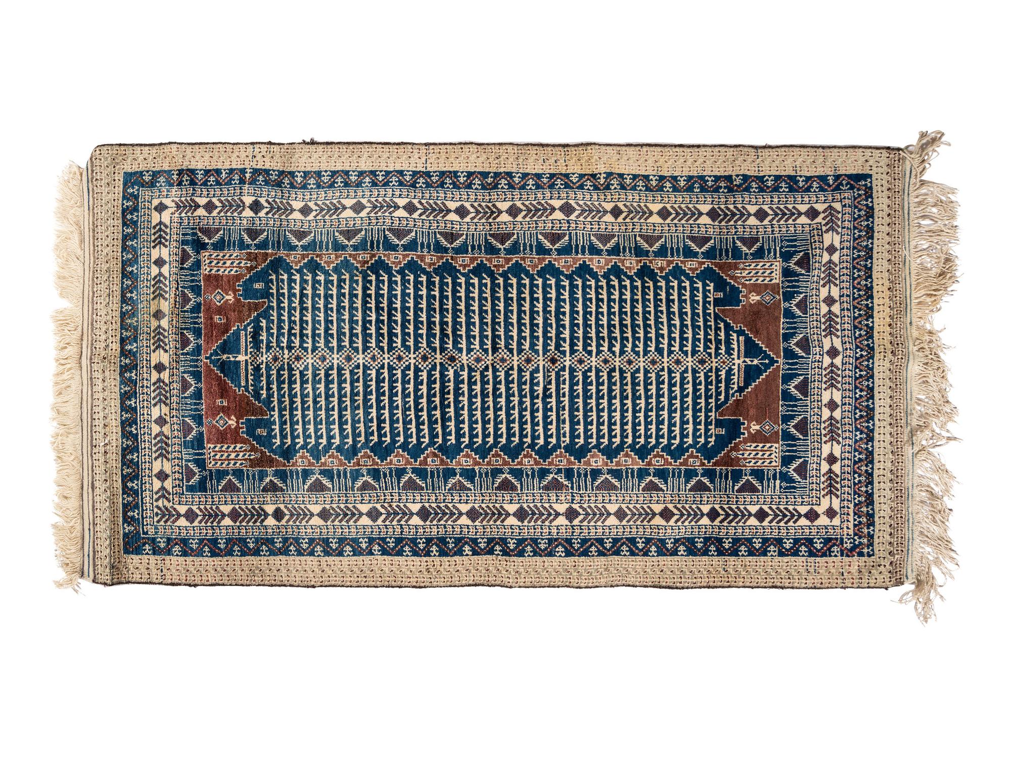 A Turkish or Afghan Wool Rug