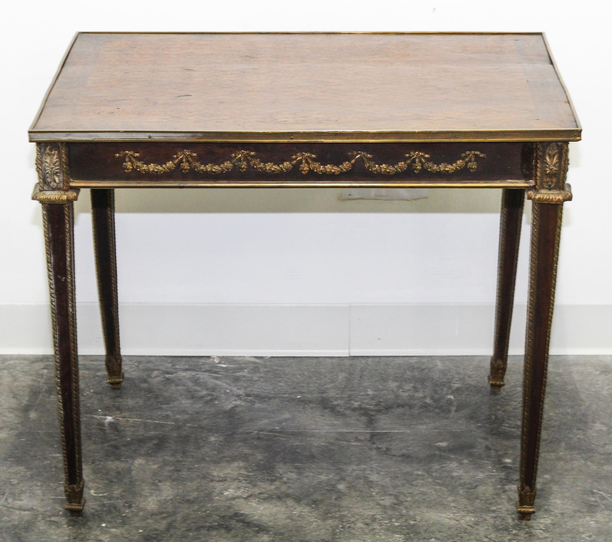 A Neoclassical Gilt Bronze Mounted Parquetry Side Table Height 25 1/2 x width 31 x depth 21 1/2 inches.