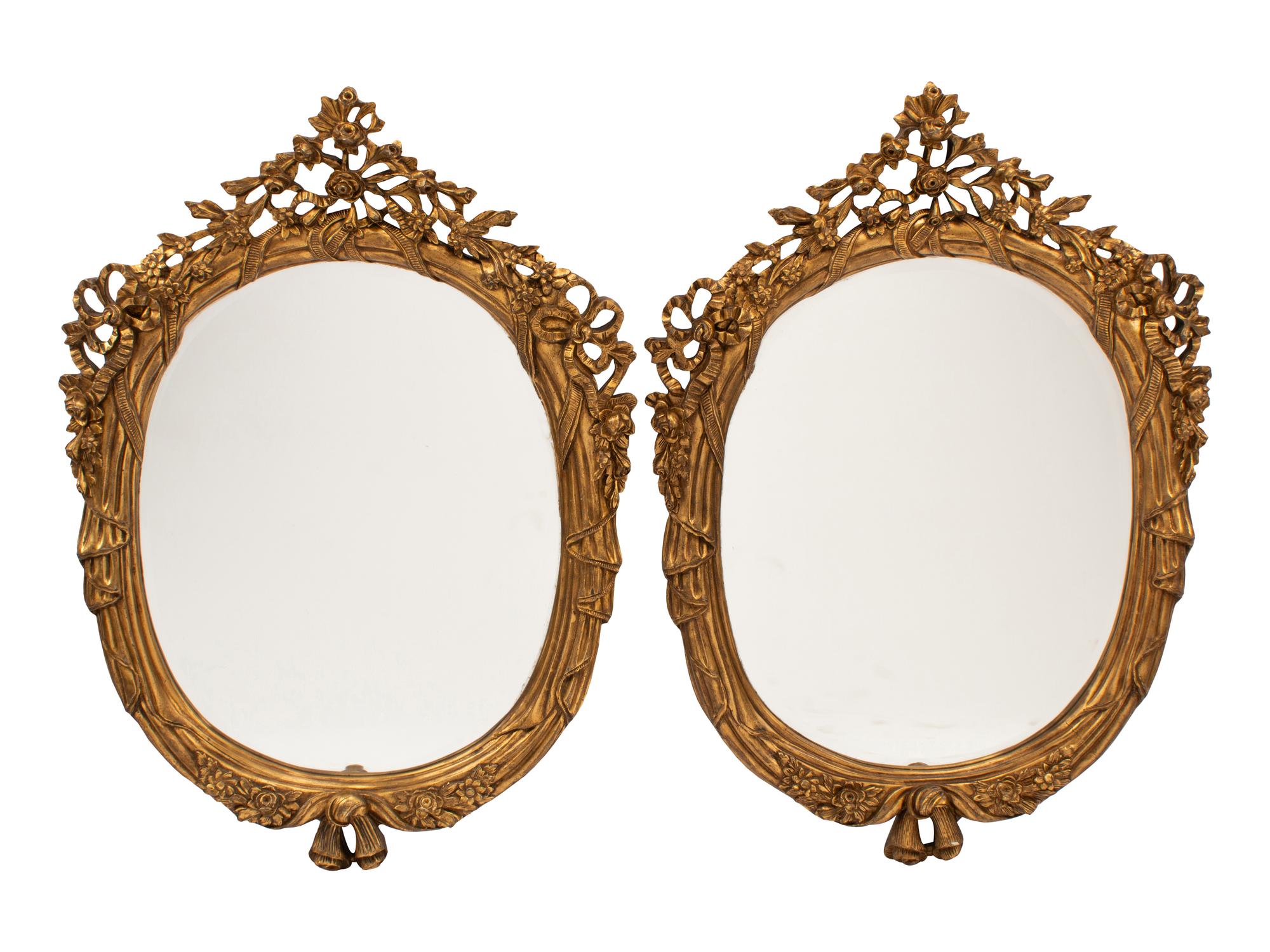 A Pair of Italian Rococo Style Gilded Mirrors