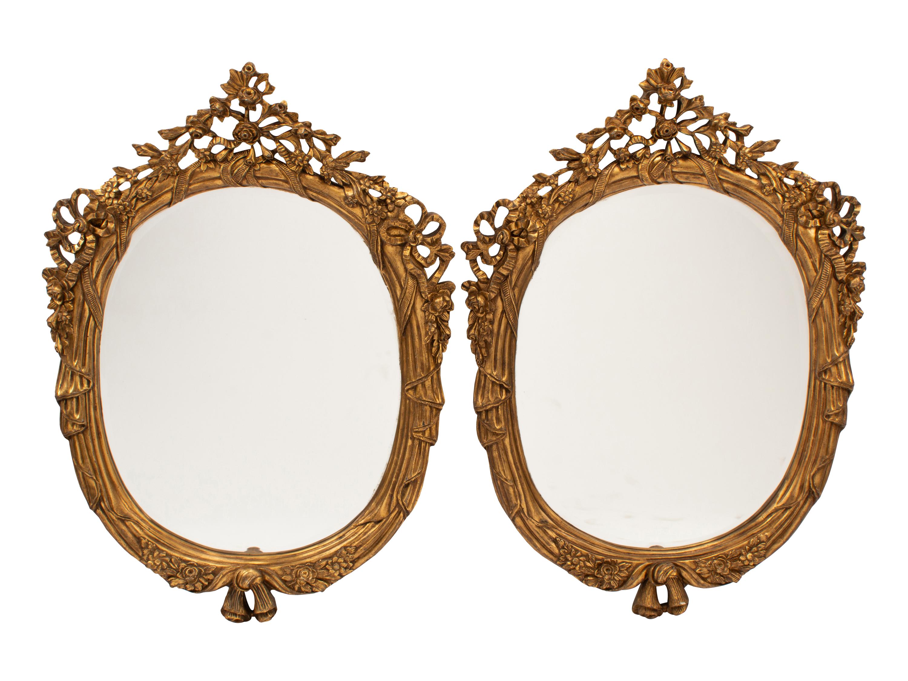 A Pair of Italian Rococo Style Gilded Mirrors