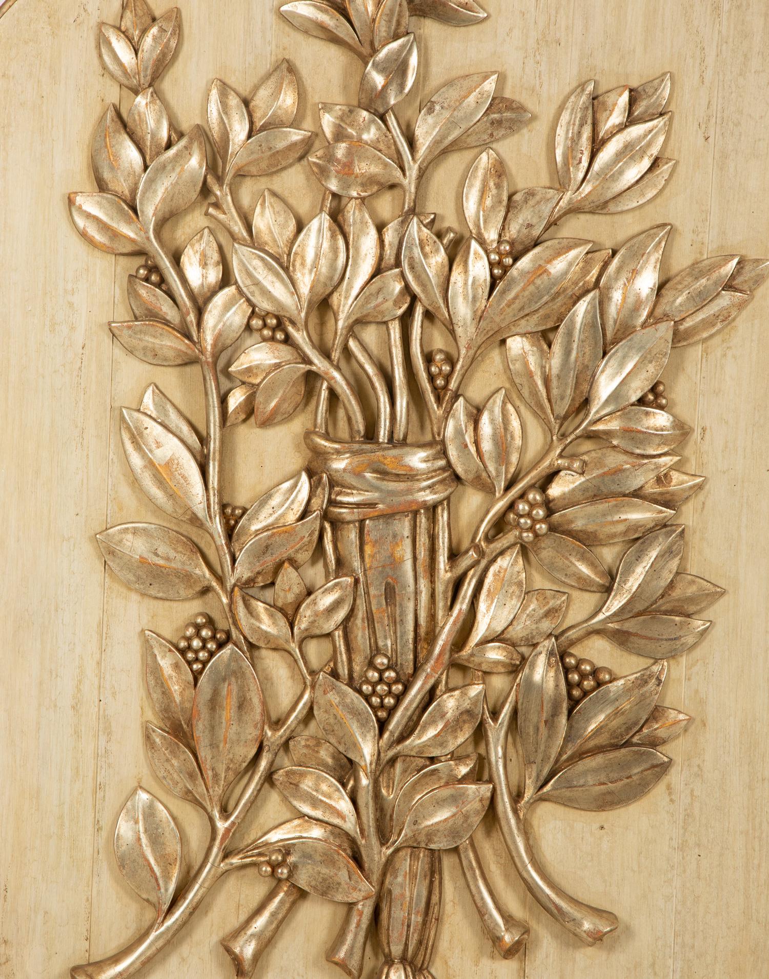 A Carved Walnut Oval Boiserie Panel by Jerry Pair, Atlanta