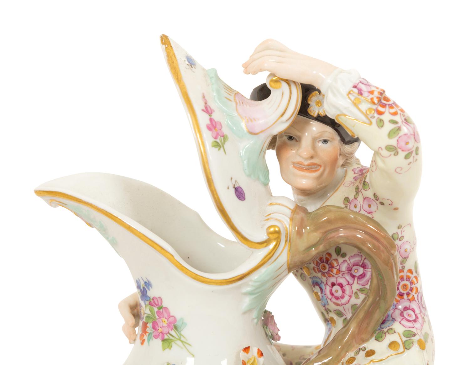 A Pair of Meissen Porcelain Figural Ewers