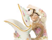 A Pair of Meissen Porcelain Figural Ewers