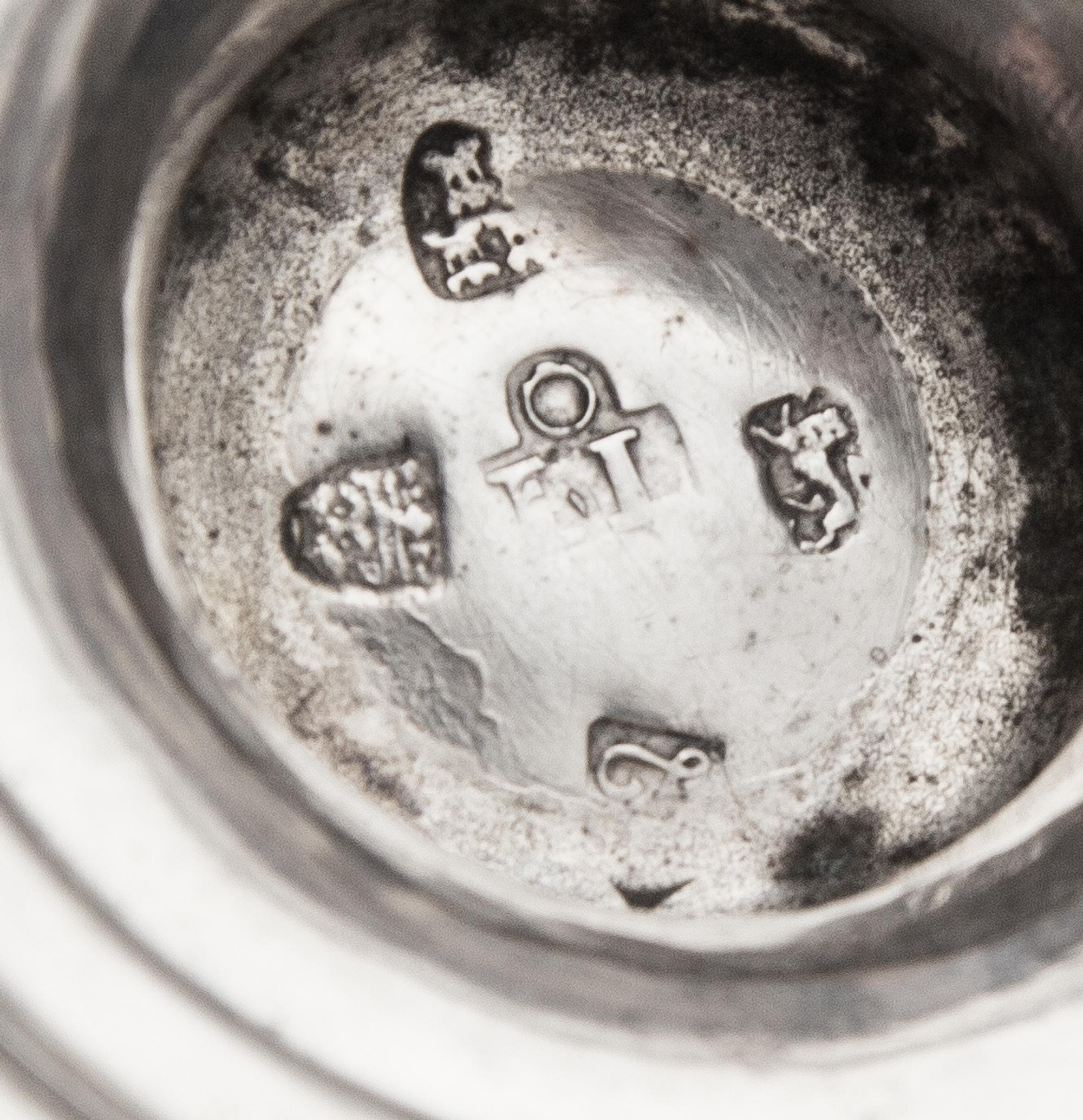 A George III Silver Twin-Handled Cup, John Langlands I, Newcastle, 1772, of baluster form with an applied waist band, having twin S-scr